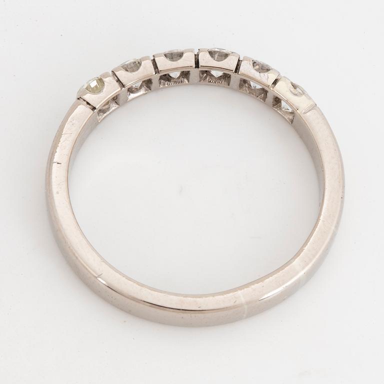 Half eternity brilliant-cut diamond ring.