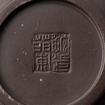 Bao Zhenglan, A brown yixing 'zodiac' teapot, China, 1990s.