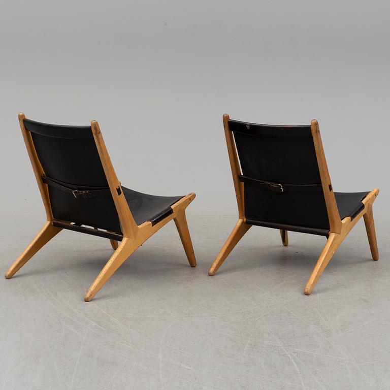 A pair of mid 20th century easy chairs by Östen Kristiansson for Luxus Vittsjö.