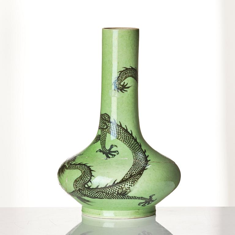 A green glazed vase with a five clawed dragons, Qing dynasty, Kangxi (1662-1722).