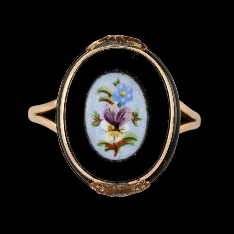 BROSCHNÅL och RING, 18k guld med emalj, 1900-talets första hälft. Vikt 10 g.