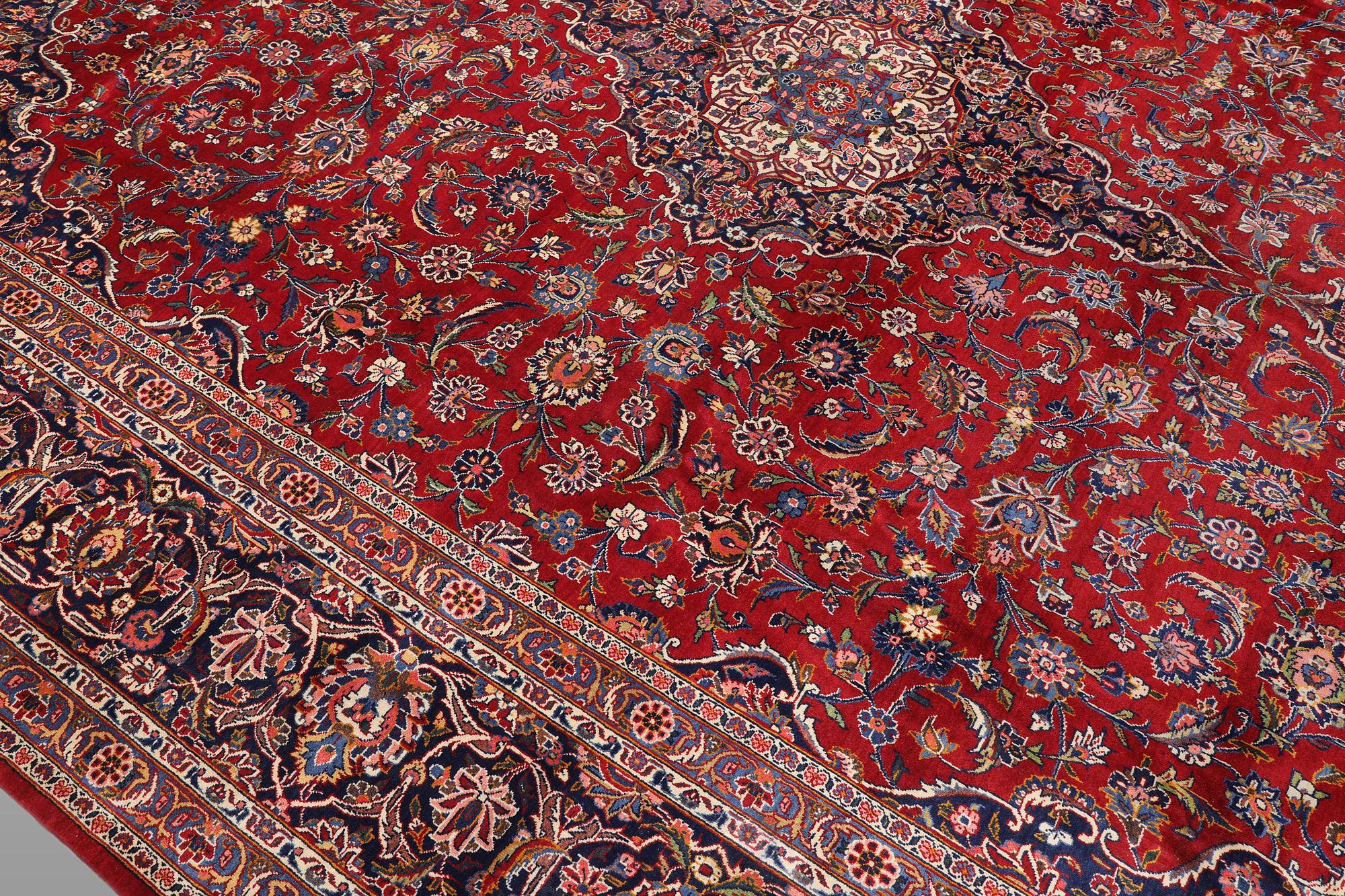 A semi-antique Keshan carpet, signed, 449 x 317 cm.