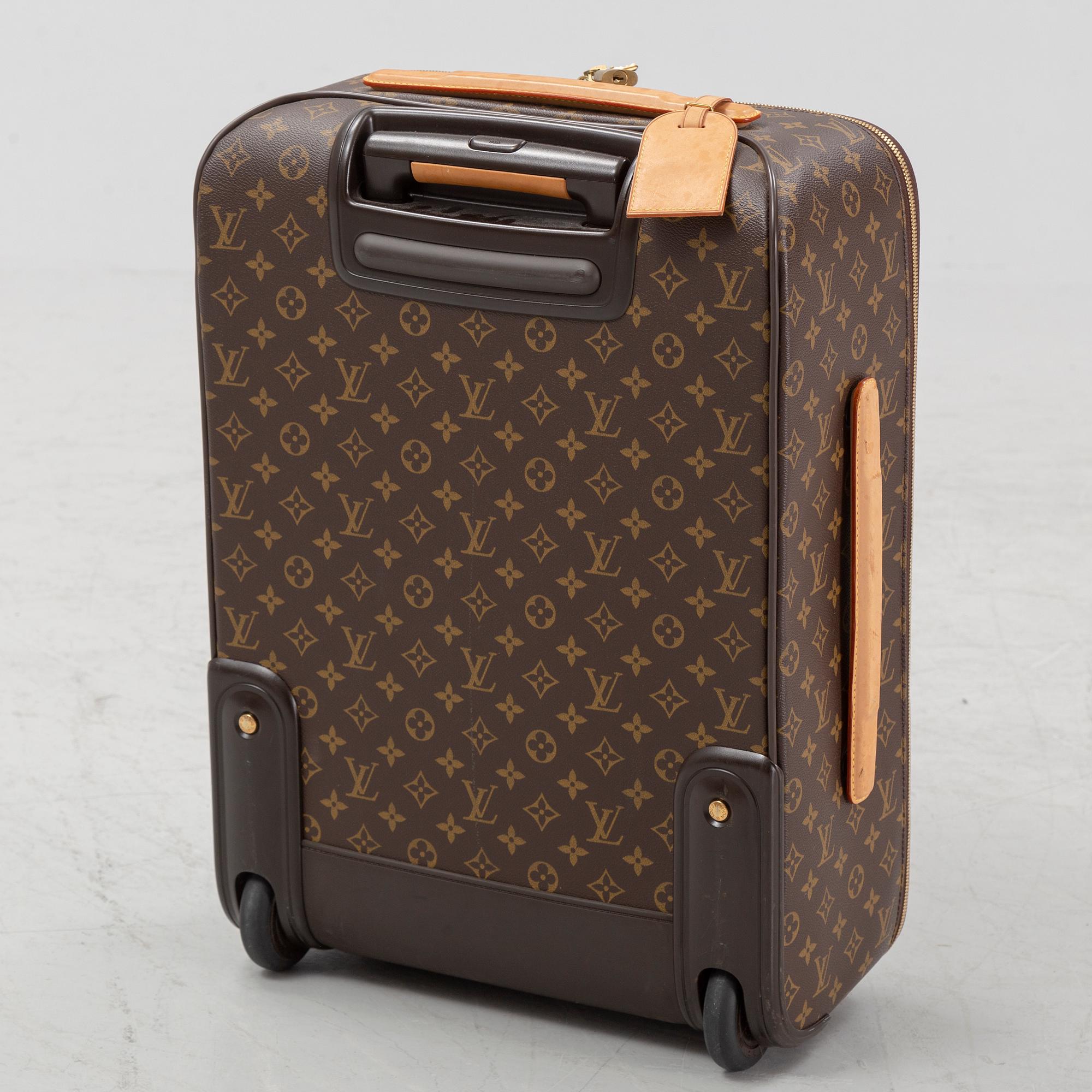 Louis Vuitton, a monogram canvas 'Pegase 55' suitcase, 2009.