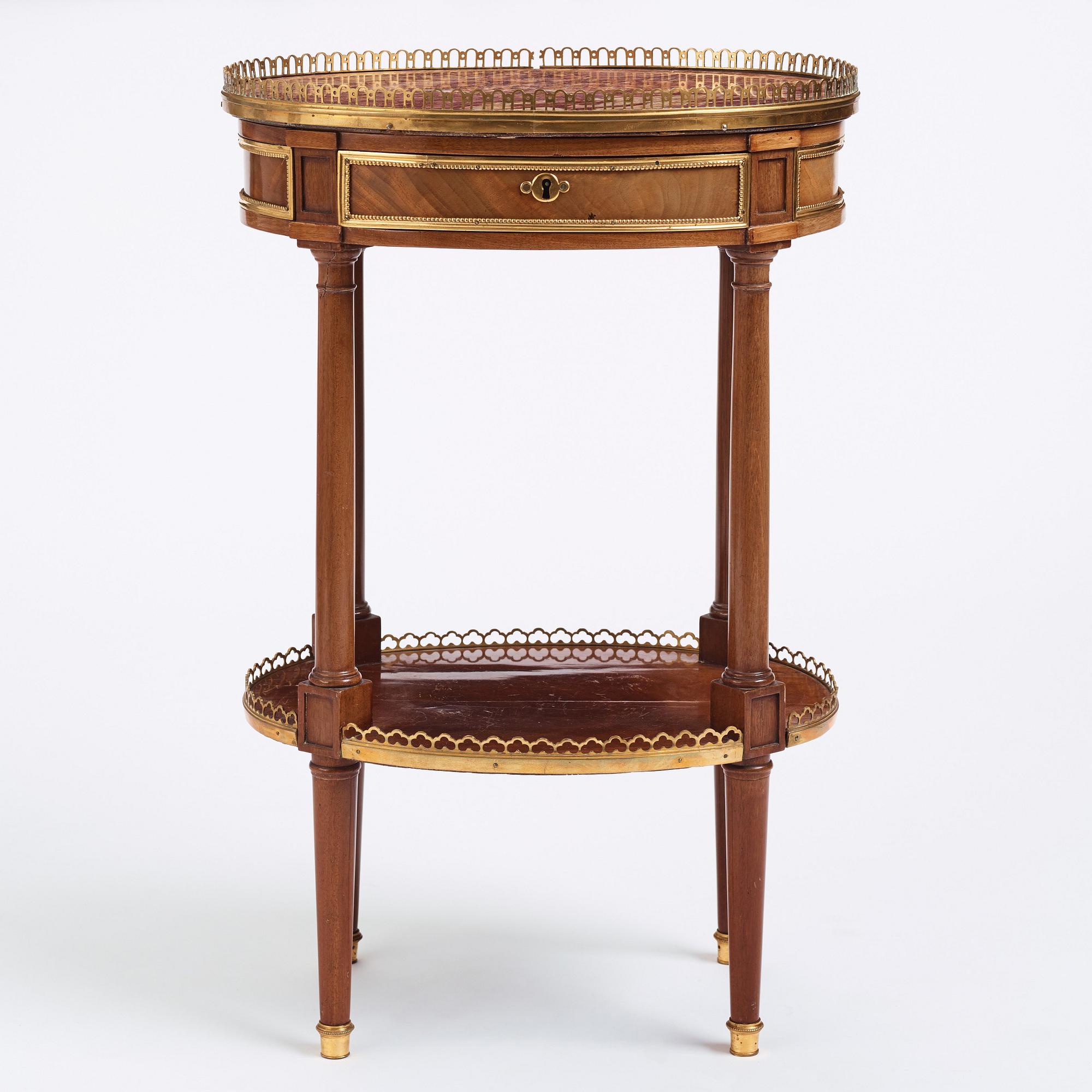 A Louis XVI mahogany and ormolu-mounted table signed Roger Vandercruse Lacroix 'RVLC' (master in Paris 1755-1799).