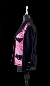 A 21th cent black velvet and cerise silk jacket by Chanel.
