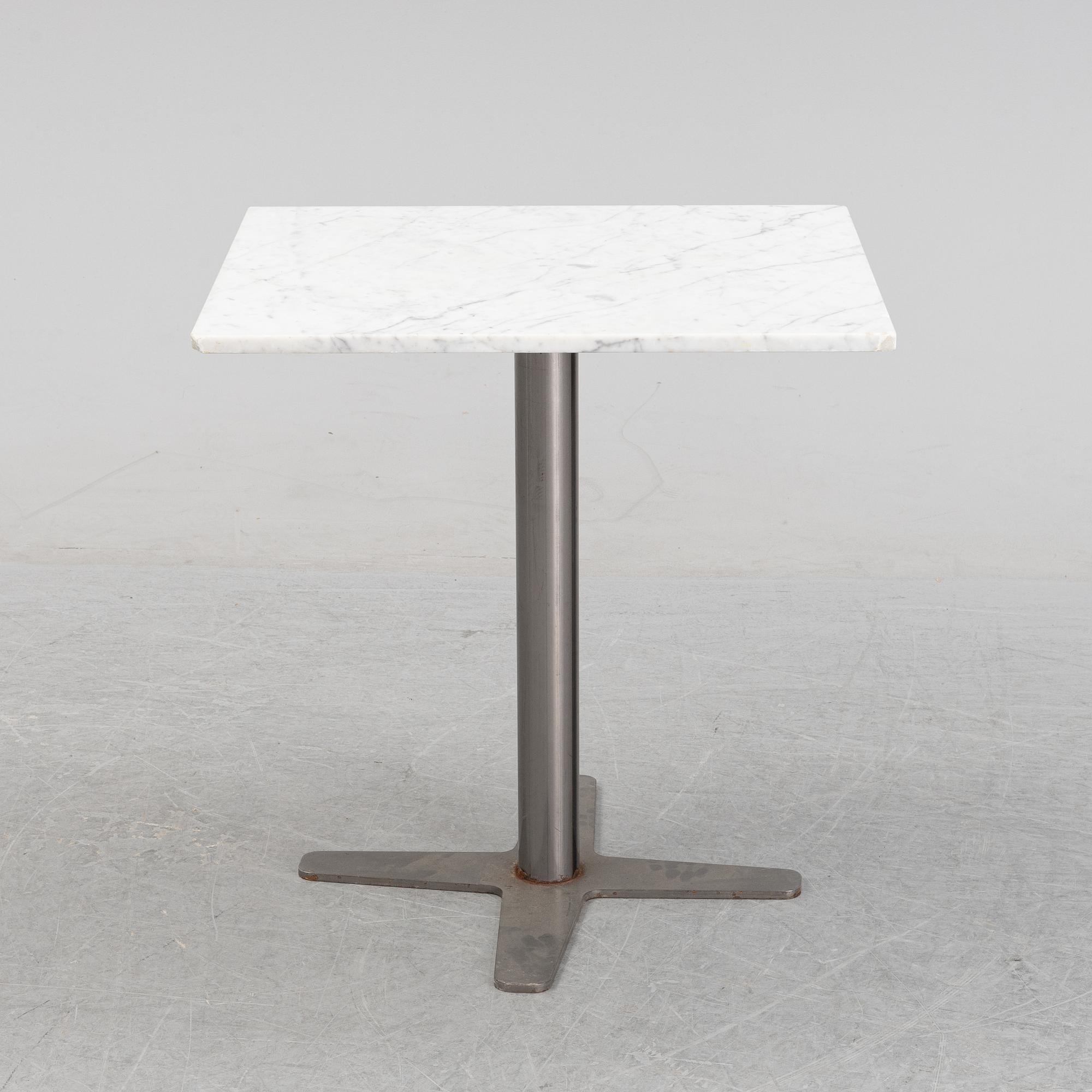A marble top table, 21th century.