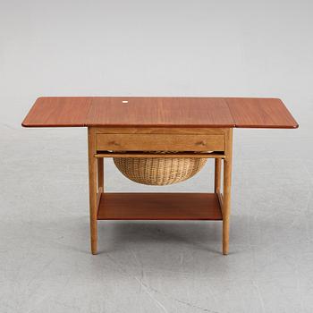 Hans J Wegner, an oak and teak AT-33 sewing table, for Andreas Tuck, Denmark.