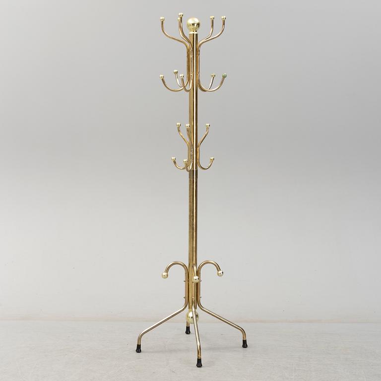 A late 20th century brass coat hanger.