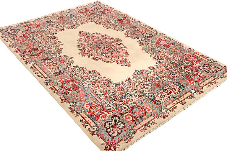 A Kerman carpet, c. 270 x 187 cm.