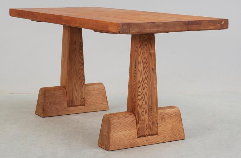 An Axel Einar Hjorth 'Utö' stained pine table, Nordiska Kompaniet, Sweden 1930's.