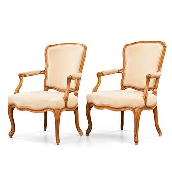 A pair of Louis XV 18th century armchairs by Francois Reuze (master in Paris 1743-1799).