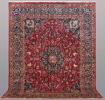 A CARPET, Mashad, signed, ca 385 x 293 cm.