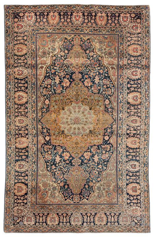 An antique Kashan 'Mohtasham' rug, c. 206 x 131 cm.