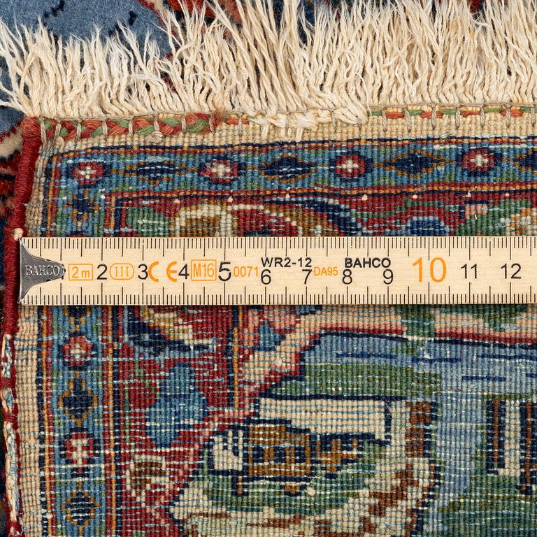 A semi-antique Kashan rug, Central Persia, c. 211 x 132 cm.