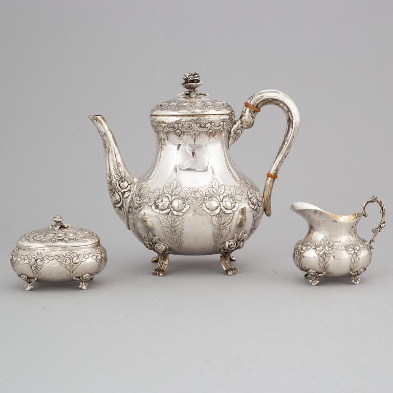 A silver coffee pot, creamer and sugar box. Swedish import mark.