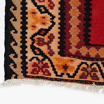 A Kilim rug, c. 300 x 165 cm.