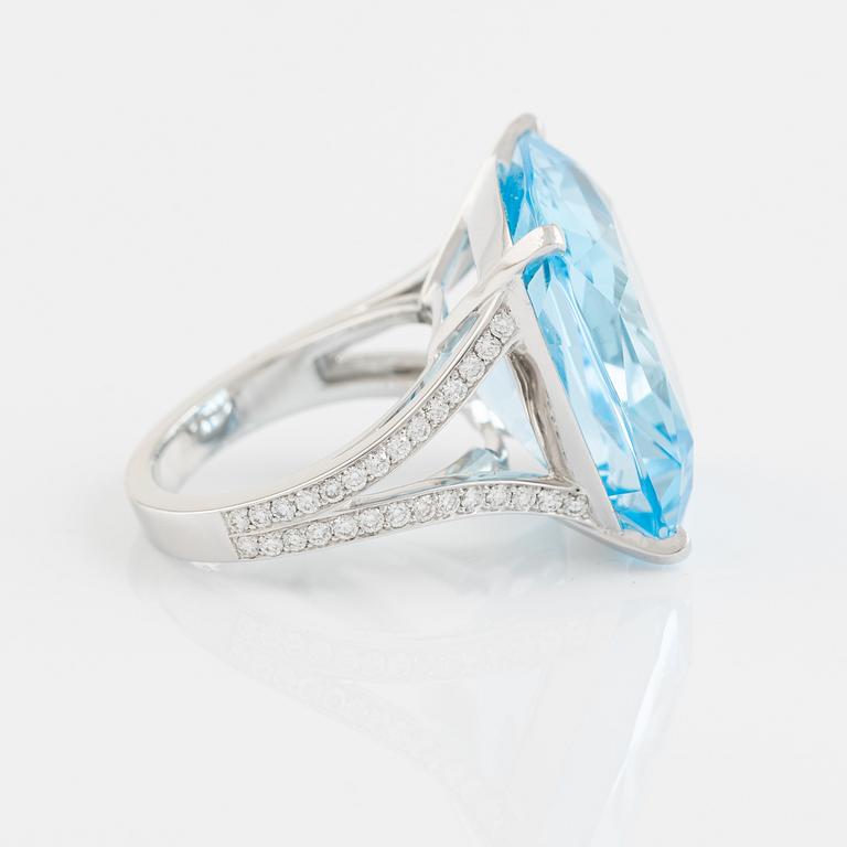 Crow's nest jewels, blue topaz and brilliant cut diamond ring.