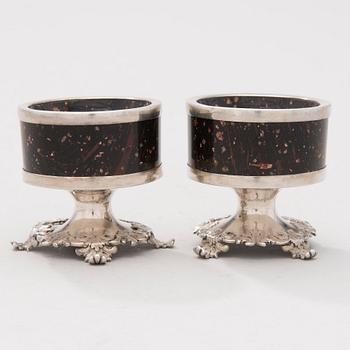 A pair of silver and porphyry salt cellars by Gustav Wahlbäck, Helsinki 1842.