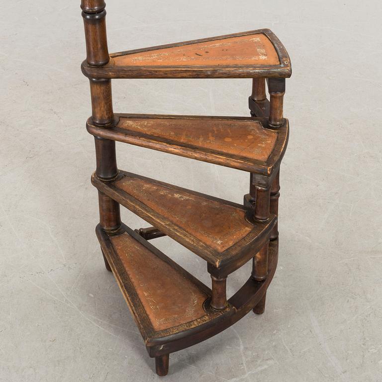 A Mahogany library ladder.