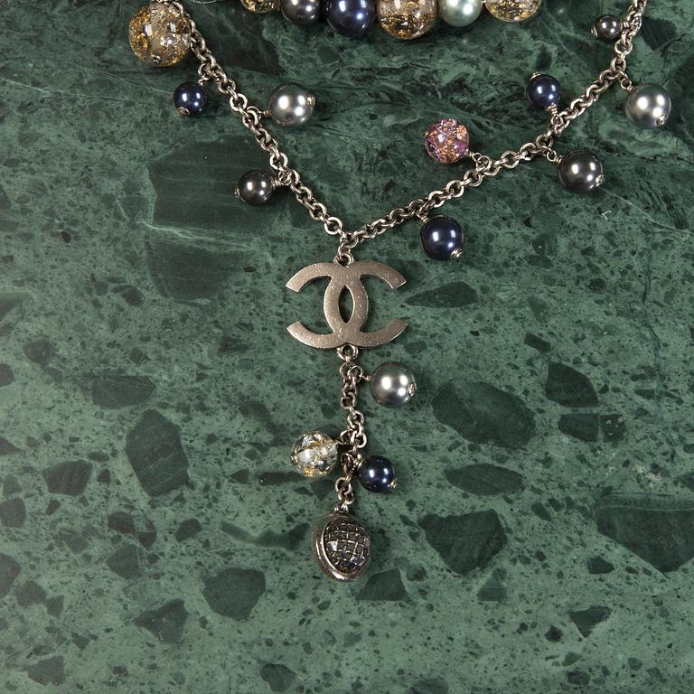 A necklace by Chanel.