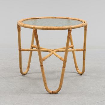 A second half of the 20th century sofa, table and armchairs.