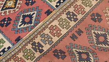 A semi-antique Kars runner, approx. 431 x 95 cm.