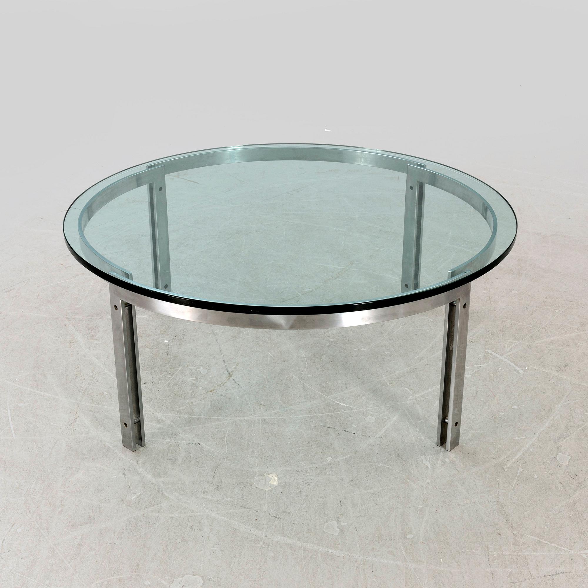 A glass and metal coffee table later part of the 20th century.