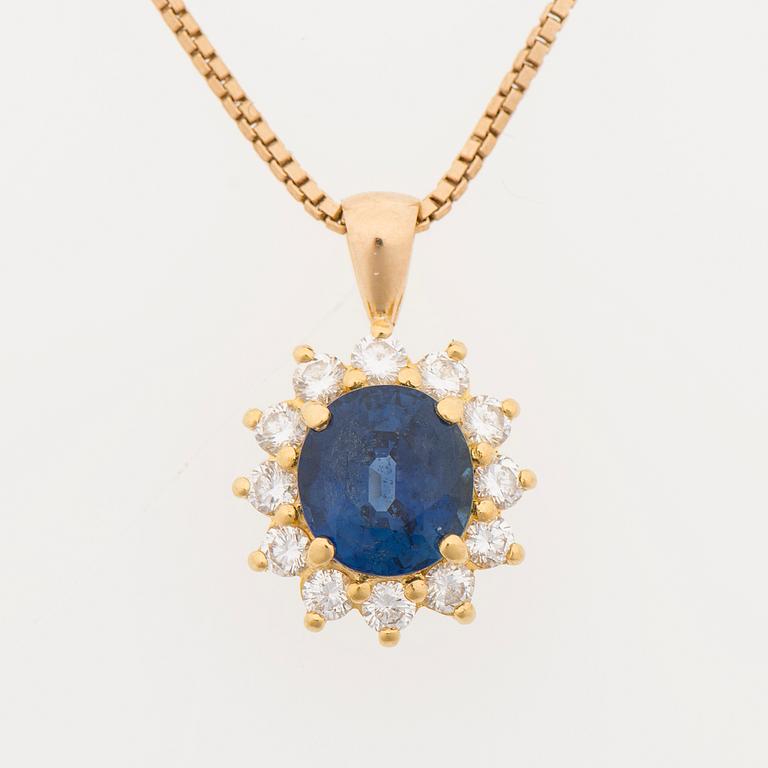 A PENDANT, facetted sapphire, brilliant cut diamonds, 18K gold.