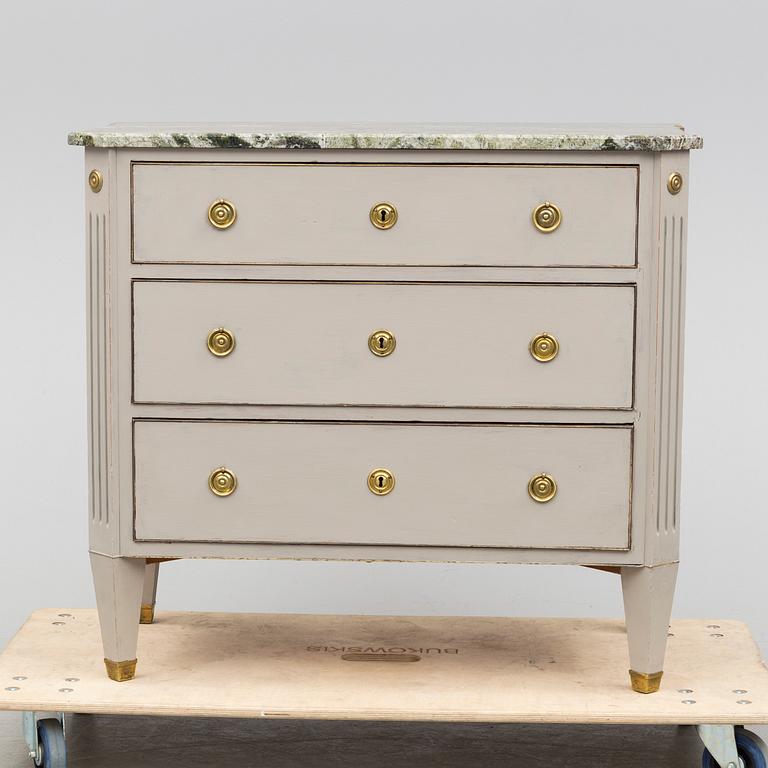 an early 20th century chest of drawers.