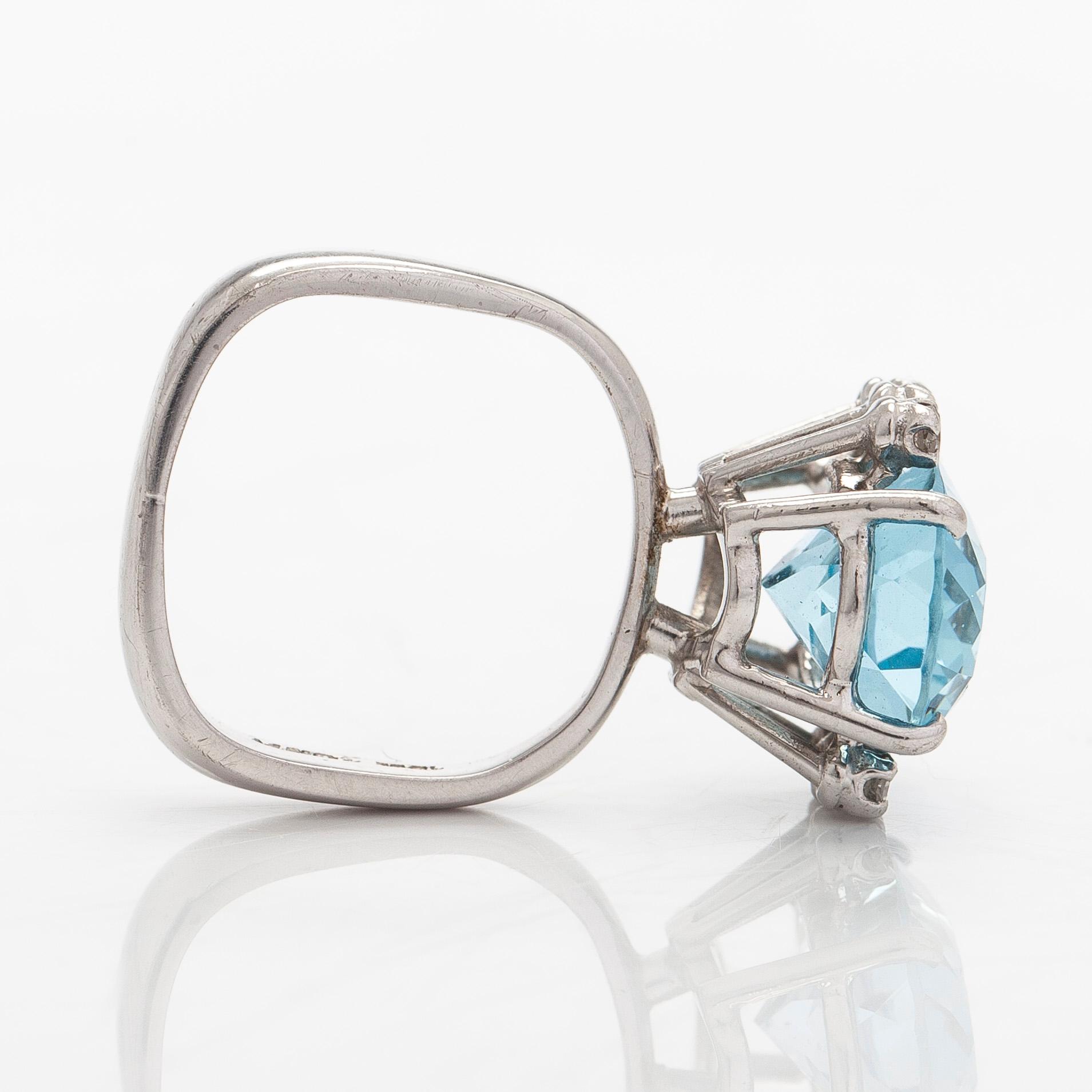 An 18K white gold ring with aquamarine and brilliant-cut diamonds, Conti, South Africa.