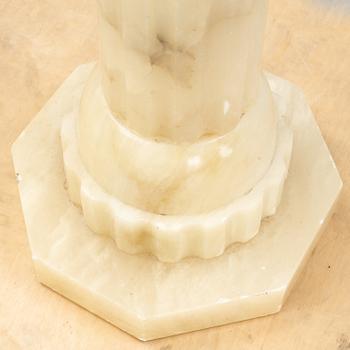 A 20th century alabaster pedestal.