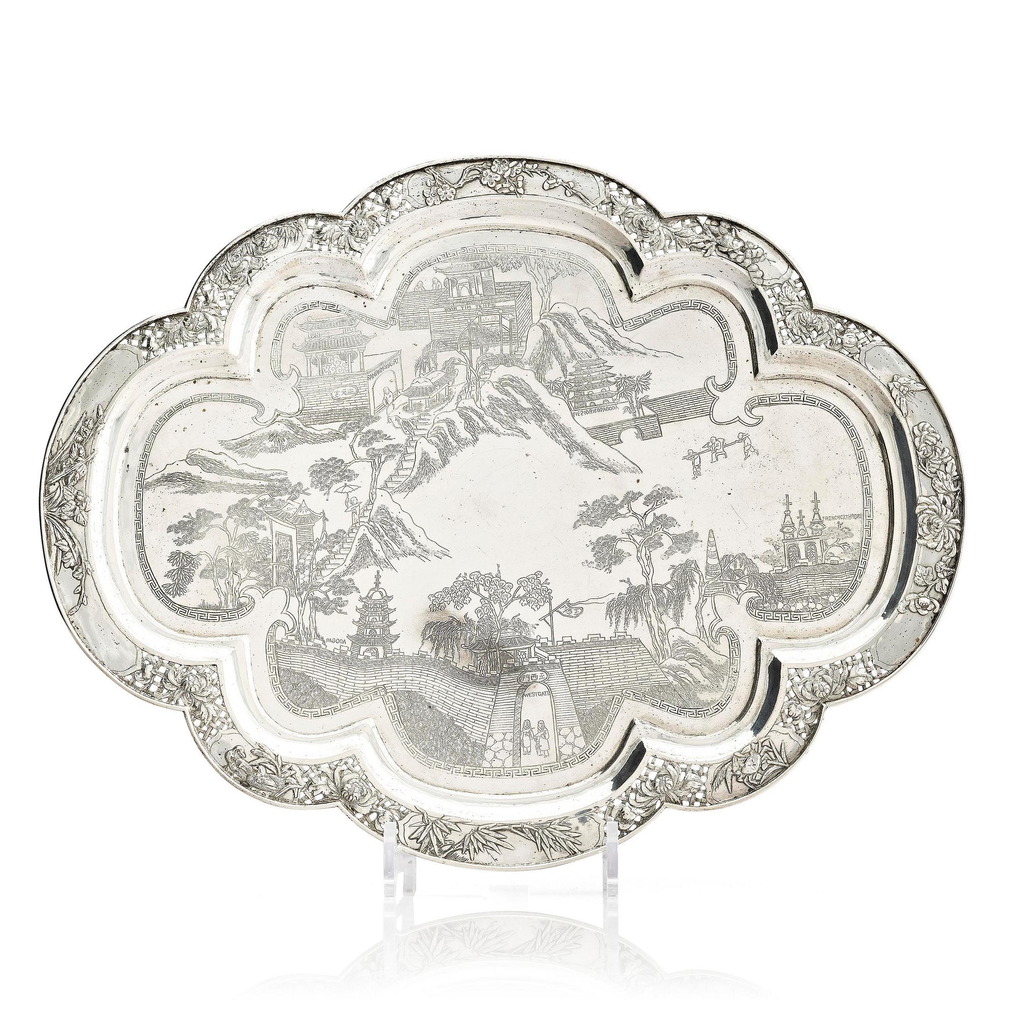 A lobed silver tray on four feet, Shanghai, Singfat, China Trade.