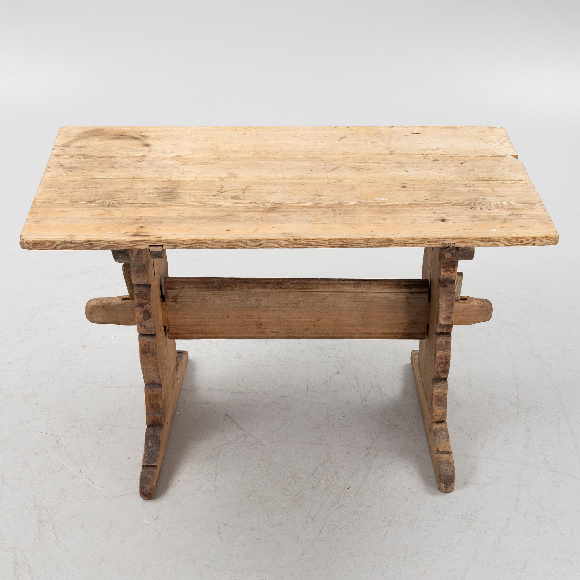 A pine trestle table, 19th century.