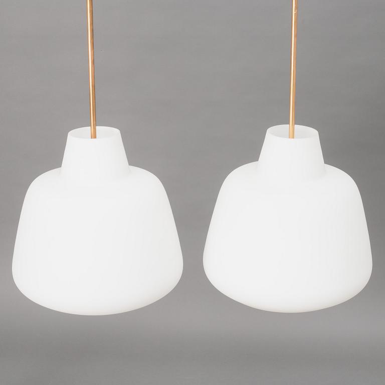 A pair of Swedish Modern ceiling lamps, mid 20th century.