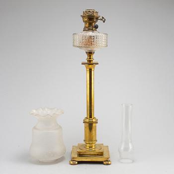 A brass oil lamp, late 19th Century.