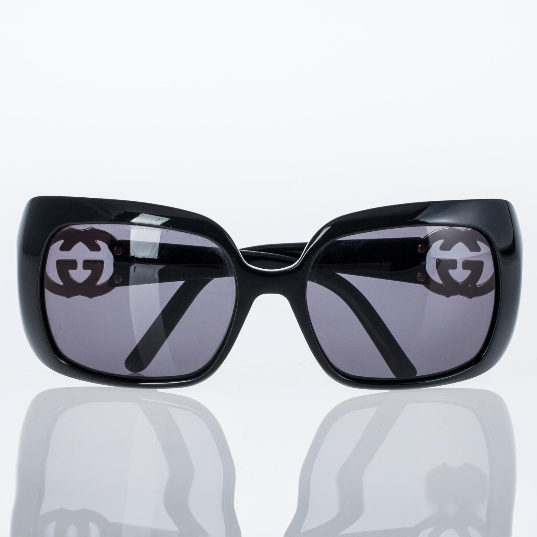 AURINKOLASIT, Gucci.