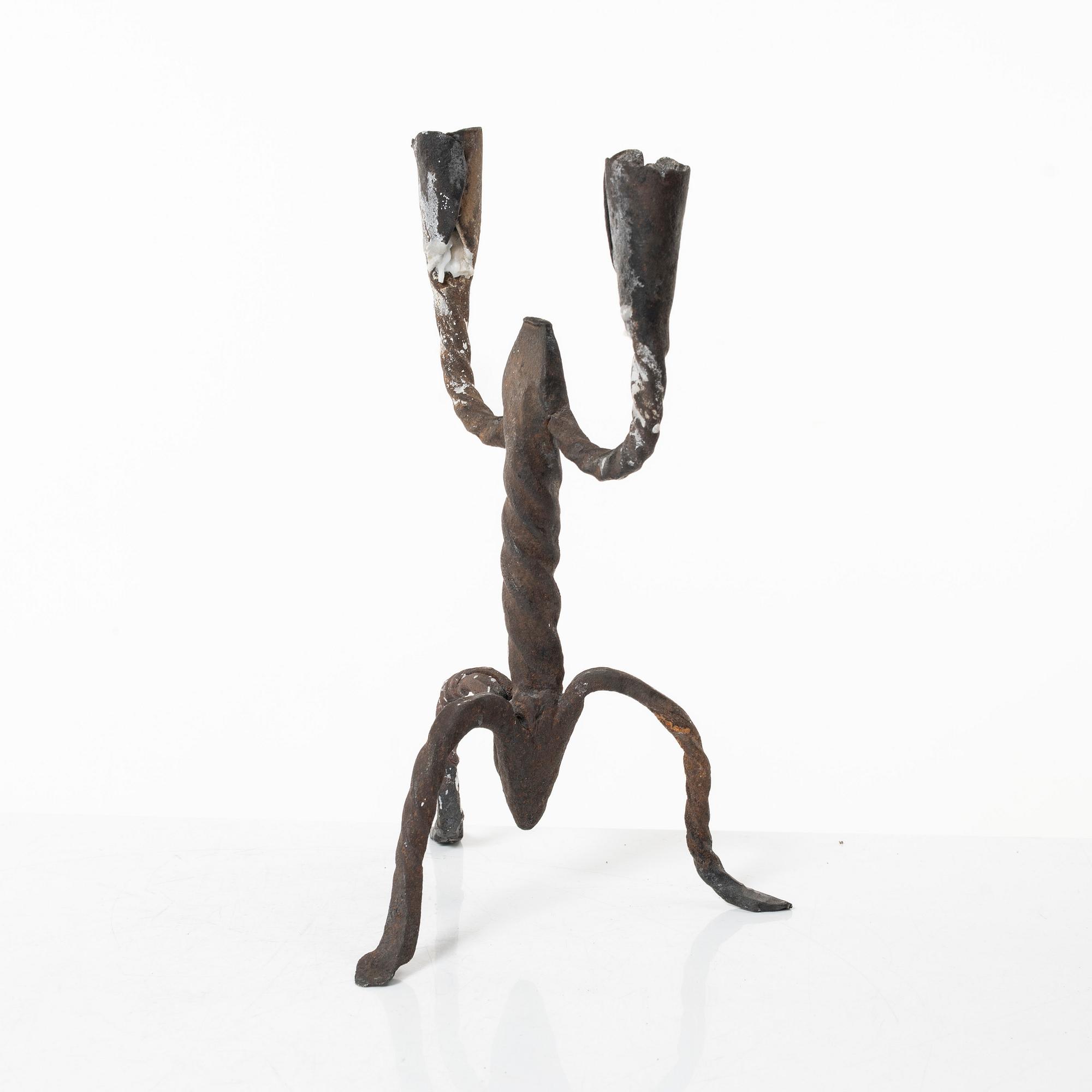 A two-light wrought iron candlestick, Sweden, 18th / early 19th century.