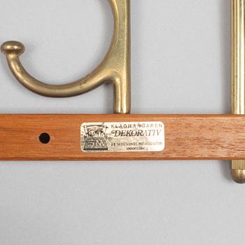 A pair of 'Dekorativ' coat hangers, Skoglunds metallgjuteri, Anderstorp, 1950's/60's.