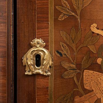A pair of Louis XVI late 18th century corner cupboards by Léonard Boudin (1735-1804), master in Paris 1761.