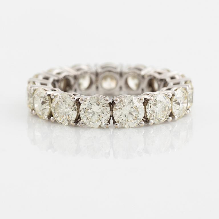 Brilliant cut diamond eternity ring.
