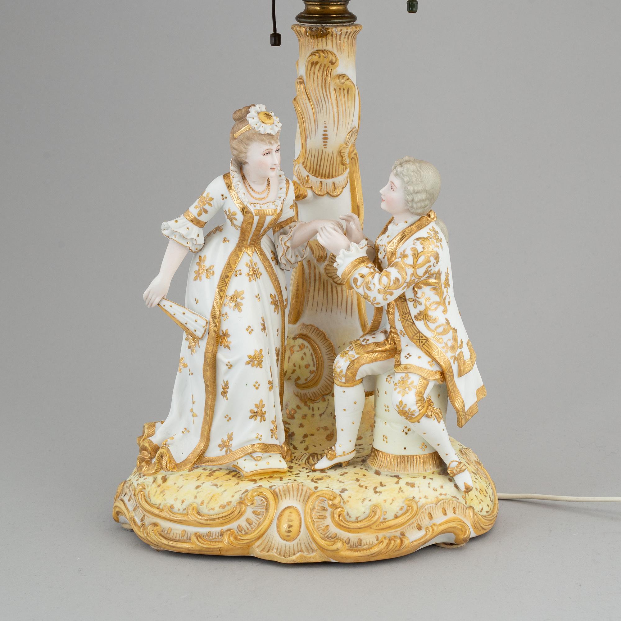 a rococo-style porcelain table lamp from the first half of the 20th century.