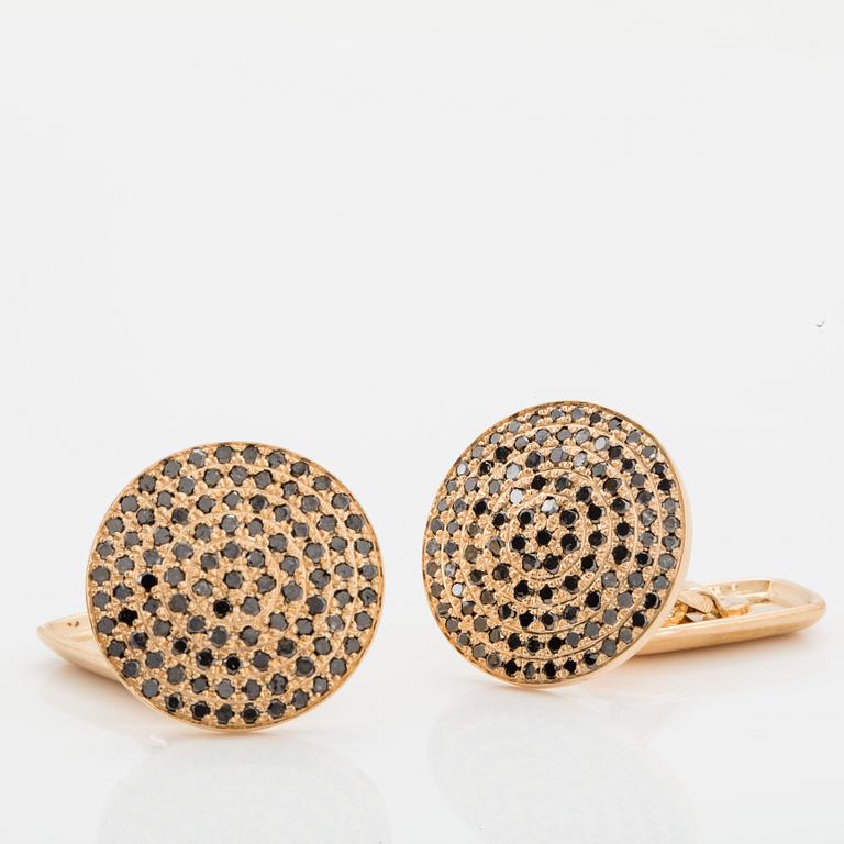 18K gold and black diamond cufflinks.