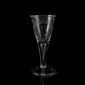 A wine glass with the monogram of the Swedish king Adolf Frederick, 18th Century.