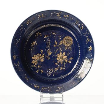 A powder blue basin and three plates, Qing dynasty, Qianlong (1736-95).