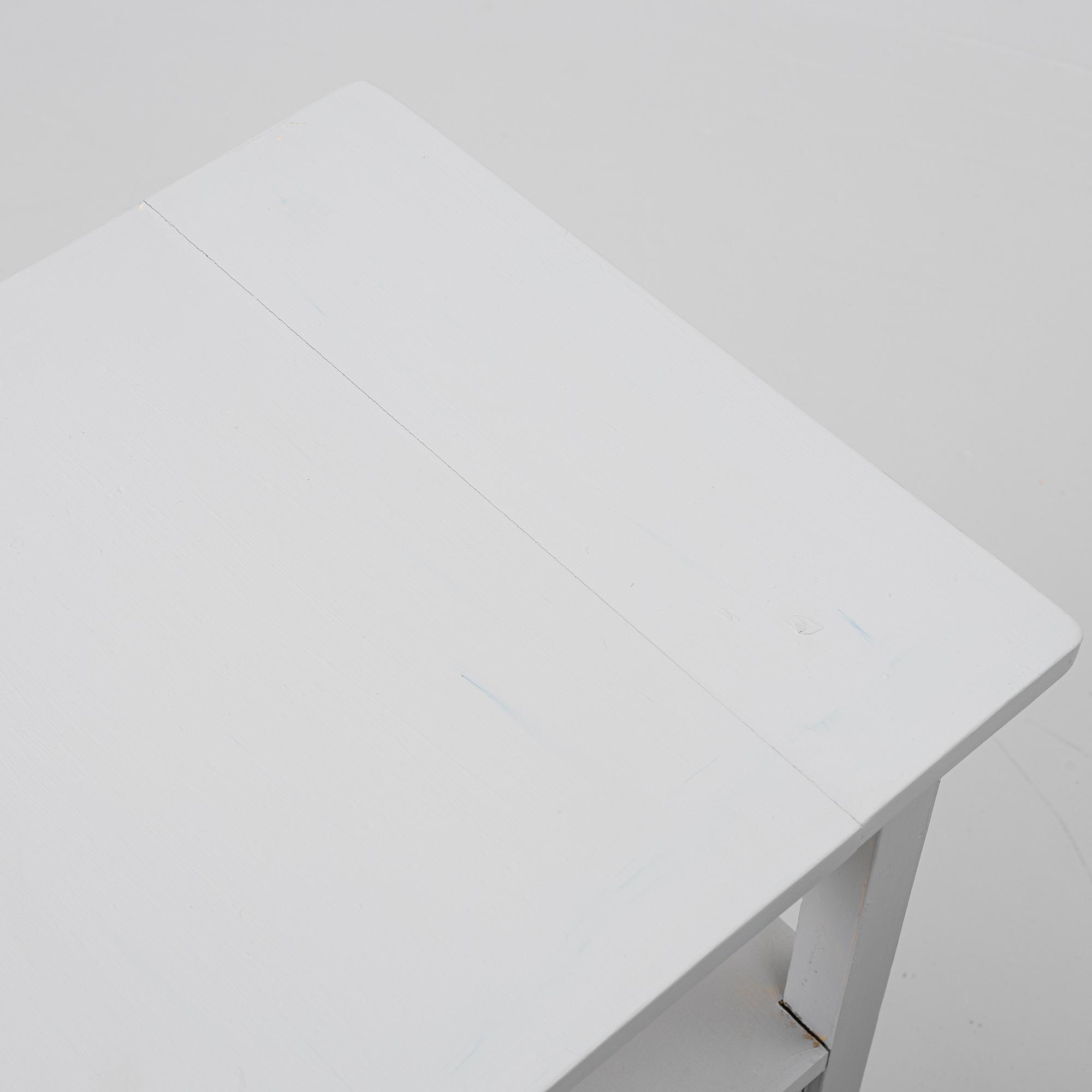 A pair of bedside tables, 20th century.