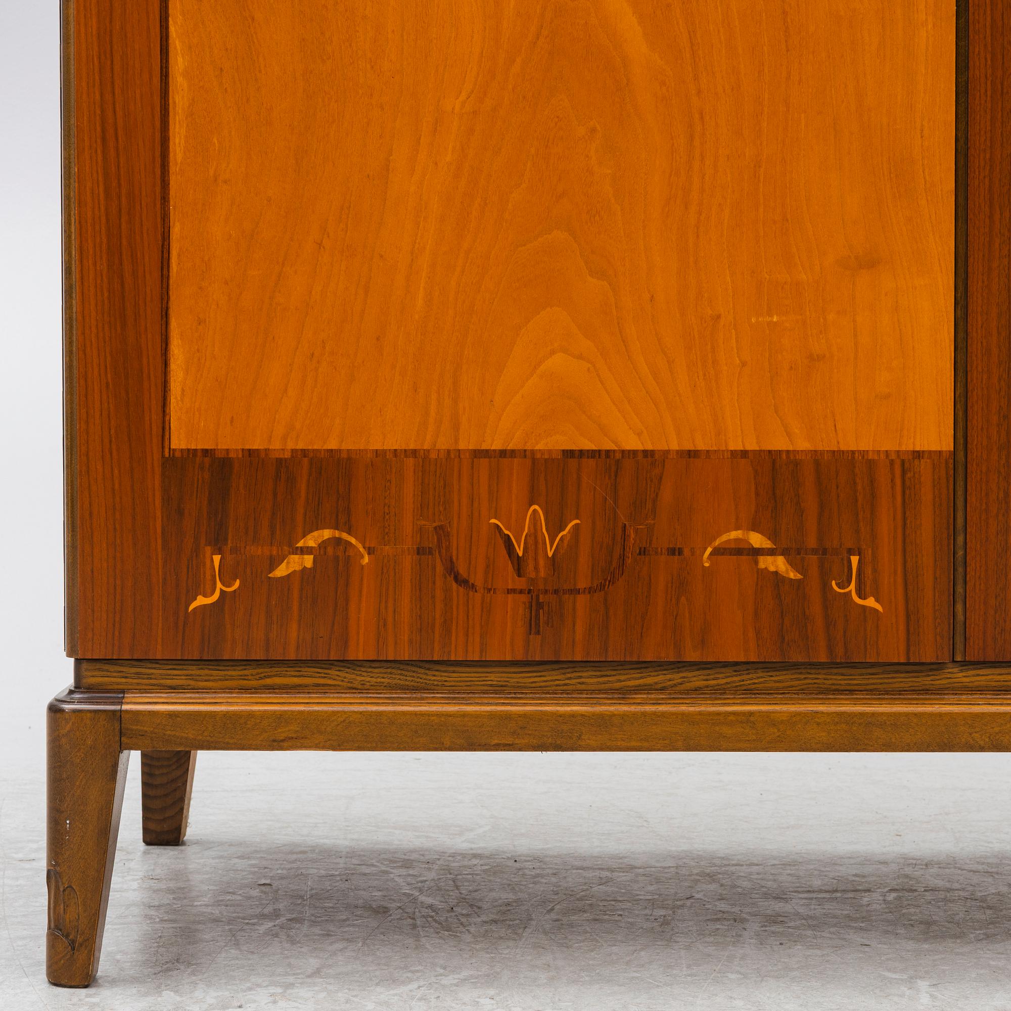 A Swedish Modern cabinet, mid20th century.