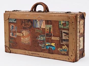 586. A late 19th cent leather suitcase by Louis Vuitton.