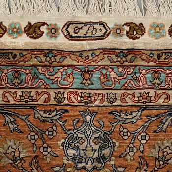 A carpet, an old silk Turkey, ca 237,5 x 146,5  cm (as well as 3,5-4 cm flat weave at the ends).