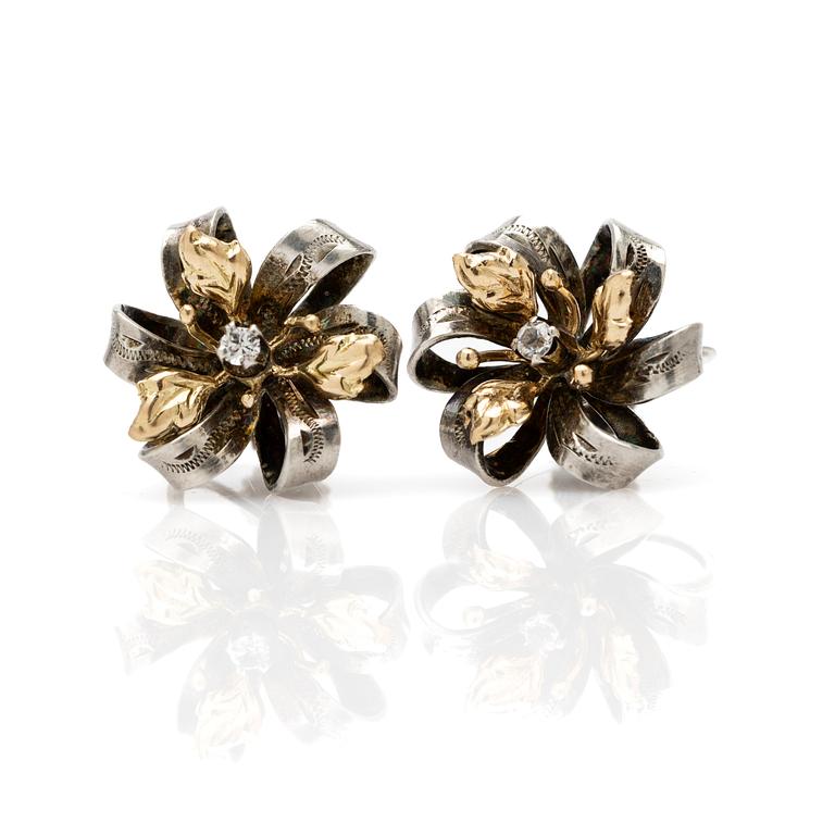 Earrings, a pair, silver and 14k gold with brilliant-cut diamond.