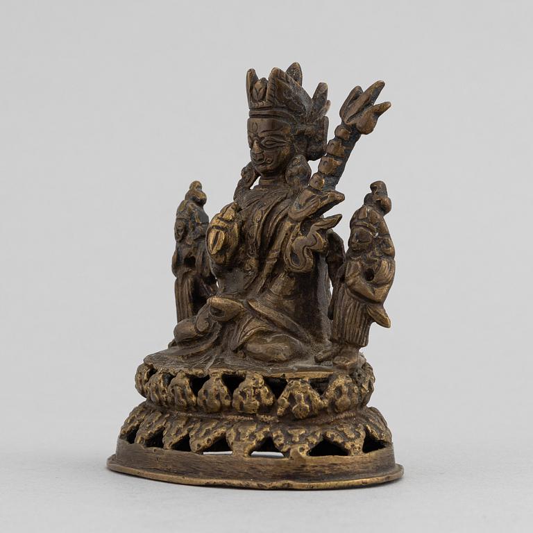 A copper alloy figure of Padmasambhāva, 19th century, presumably Tibet/Sino Tibetan.